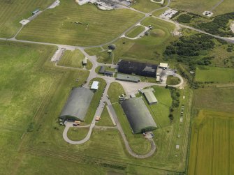 Oblique aerial view centred on the dispersal area, taken from the NNW.