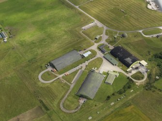 Oblique aerial view centred on the dispersal area , taken from the NW.