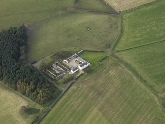 Oblique aerial view centred on the farmstead, taken from the SE.