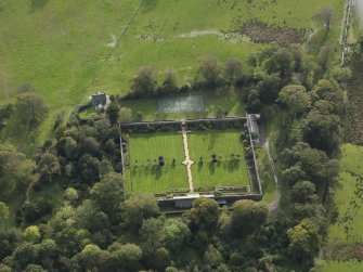 Oblique aerial view centred on the gardens, taken from the NNE.