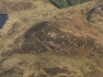 Oblique aerial view centred on Muclich Hill, taken from the W.