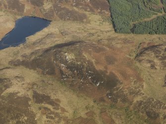 Oblique aerial view centred on Muclich Hill, taken from the SW.