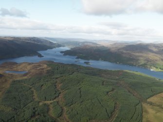 Oblique aerial view looking from Badlia Hill towards the Kyles of Bute, taken from the SW.