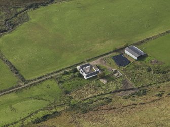 Oblique aerial view centred on the farmstead, taken from the E.