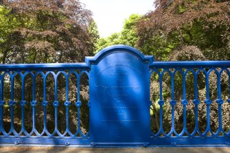 Detail of plaque and railings on North side