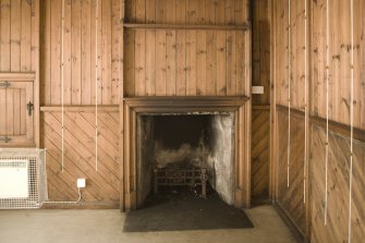 Interior. Detail of fireplace and panelling in Old Glover's Hall from W