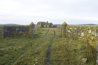 View of entrance gateway and NE driveway, looking to Vallay House, taken from NE