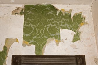 Interior detail, remnant of original wallpaper within the stair hall of Vallay House