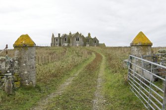 View looking along E driveway towards Vallay House, including E gatepiers