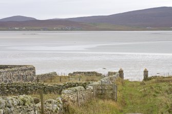 View to N Uist from the driveway of Old Vallay House and the Chamberlain's house,  with the SE gatepiers and Vallay Strand in the foreground, taken from NW