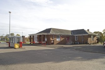 General view from WNW of main gate lodge and special search.