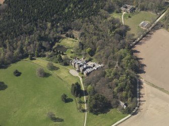 Oblique aerial view centred on the country house, taken from the ESE.