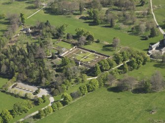 Oblique aerial view centred on the walled garden, taken from the NNW.