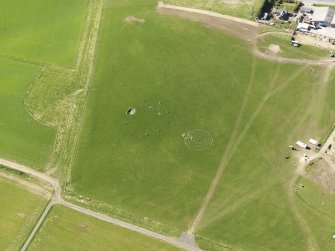 Oblique aerial view centred on the modern recumbent stone circle, taken from the ESE.