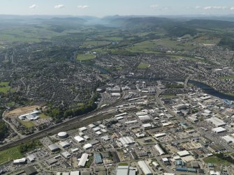 Oblique aerial view of the Citadel area of Inverness and the Longman Industrial Estate with Loch Ness beyond, taken from the NE.