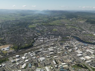 Oblique aerial view of the Citadel area of Inverness and the Longman Industrial Estate with Loch Ness beyond, taken from the NE.