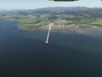 General oblique aerial view centred on the quay with Evanton airfield and the village of Evanton beyond, taken from the E.