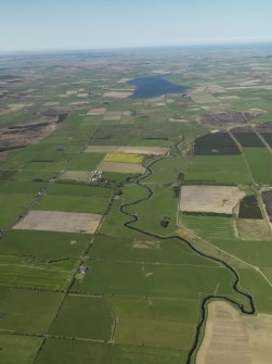 General oblique aerial view looking along the Wick River and across Bilbster towards Loch Watten, taken from the ESE.