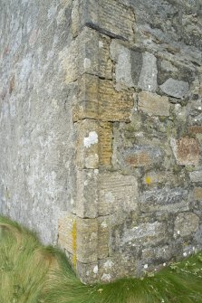 Detail of dressed stone quoins at north west corner of church