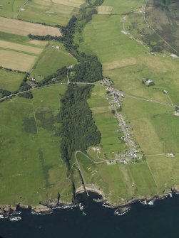 Oblique aerial view centered on the harbour at Latheronwheel, taken from the SE.