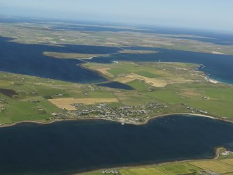 Oblique aerial view of Burray with the Churchill Barriers and Mainland beyond, taken from the S.