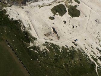 Oblique aerial view of the Links of Noltland showing the 2009 excavation area and the remains of earlier excavations, taken from the SSW.