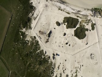 Oblique aerial view of the Links of Noltland showing the 2009 excavation area and the remains of earlier excavations, taken from the SSE.