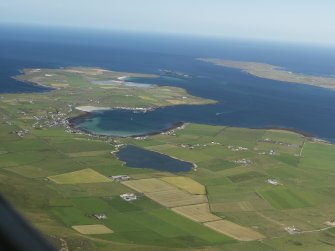 General oblique aerial view looking towards the NE end of Westray, across Loch Saintear and the Bay of Pierowall, taken from the SW.