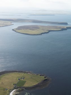 General oblique aerial view looking across the Lashy Sound towards the Calf of Eday, taken from the E.