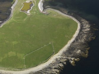 Oblique aerial view of the burial cairns at Styes of Brough, taken from the WNW.