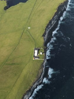 Oblique aerial view centred on Copinsay lighthouse, taken from the SSW.