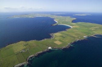 General oblique aerial view looking from the S end of Westray with Papa Westray to the top right, taken from the SE.