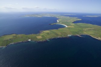 General oblique aerial view looking from the S end of Westray with Papa Westray to the top right, taken from the SE.