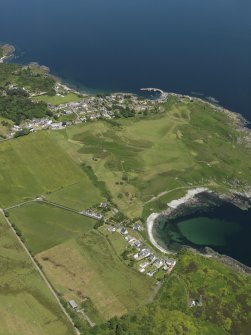 General oblique aerial view centred on the golf course at Port Righ with Carradale adjacent, taken from the SSW.