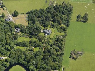 Oblique aerial view centred on Carradale Country House, taken from the WSW.