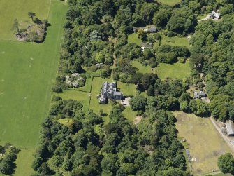 Oblique aerial view centred on Carradale Country House, taken from the ENE.