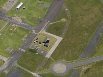 Oblique aerial view centred on the control tower, taken from the NW.