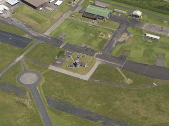 Oblique aerial view centred on the control tower, taken from the SW.