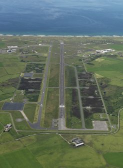 General oblique aerial view centred on the airfield, taken from the ESE.