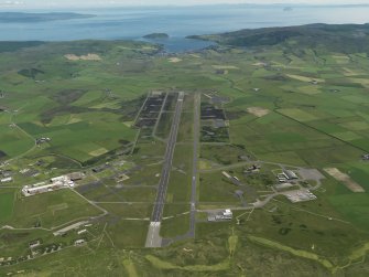 General oblique aerial view centred on the airfield, taken from the WNW.