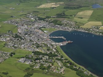 General oblique aerial view centred on the town, taken from the S.