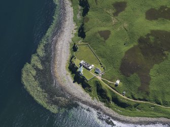 Oblique aerial view centred on the lighthouse with the observation tower adjjacent, taken from the N.