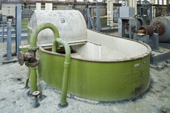 Interior.  Detail of a beater retaining a drum mechanism in the pulping and blending house.