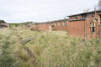 General view from S of acid shifting room and other buildings.