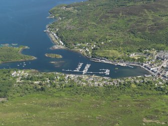 General oblique aerial view centred on the village, taken from the NW.