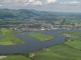 General oblique aerial view (distant) centred on the town, taken from the SW.