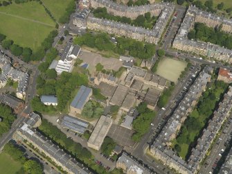 Oblique aerial view centred on Bruntisfield House with High School and Primary School adjacent, taken from the SE.