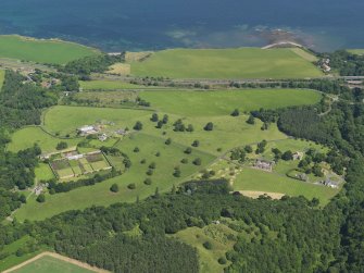 General oblique aerial view of Dunglass, taken from the SSW.