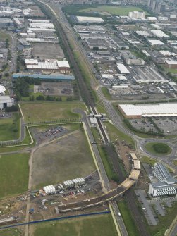 General oblique aerial view of the construction of the bridge on the Edinburgh Tram at Cultin's Road, Hermiston Gait, taken from the W.