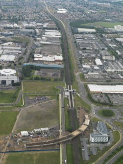 General oblique aerial view of the construction of the bridge on the Edinburgh Tram at Cultin's Road, Hermiston Gait, taken from the W.